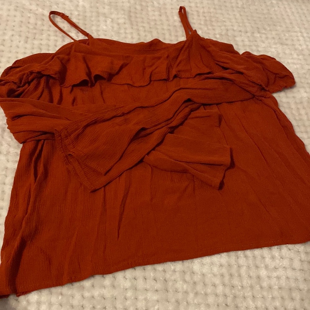 Ruffled Over the shoulder strap blouse!